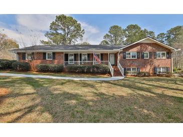 Photo one of 2232 Timber Sw Ln Snellville GA 30078 | MLS 7353630