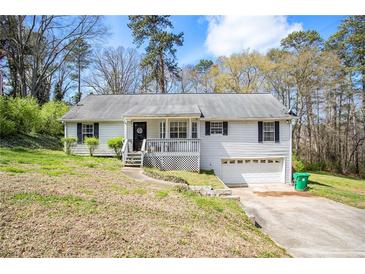 Photo one of 6158 Silver Spur Dr Lithonia GA 30058 | MLS 7354304