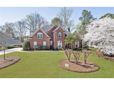 Photo one of 6310 Rutherford Pl Suwanee GA 30024 | MLS 7355518