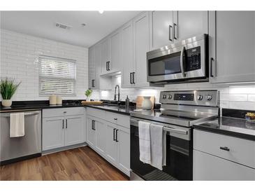 Photo one of 135 N River Dr Unit H Atlanta GA 30350 | MLS 7356775