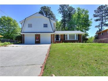 Photo one of 909 Holly Hedge Rd Stone Mountain GA 30083 | MLS 7370004