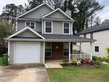 Photo one of 5081 Brittany Dr Stone Mountain GA 30083 | MLS 7370458