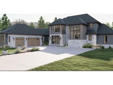 Modern home with stone and gray siding, three-car garage, and landscaping at 1527 Adora Ln, Duluth, GA 30097