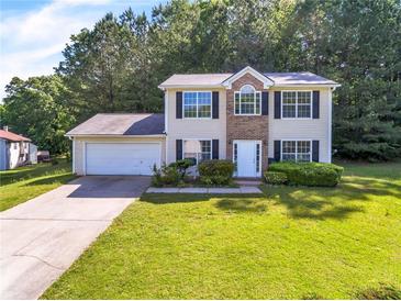 Photo one of 5989 Valley Green Rd Lithonia GA 30058 | MLS 7379380
