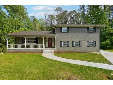 Photo one of 1302 Mannbrook Dr Stone Mountain GA 30083 | MLS 7380913