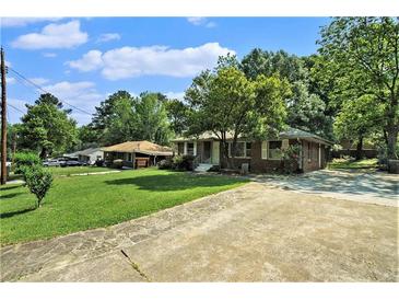 Photo one of 1210 Lloyd Dr Forest Park GA 30297 | MLS 7384278