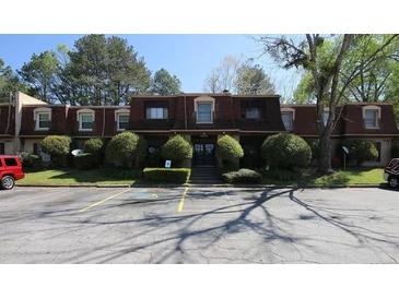 Front view of a multi-unit building with ample parking at 2936 Parc Lorraine # 2936, Lithonia, GA 30038