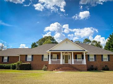 Photo one of 3550 Bay Creek Church Rd Loganville GA 30052 | MLS 7392957