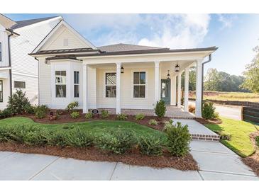 Charming craftsman style home with front porch and landscaping at 499 Godfrey Dr, Cumming, GA 30040
