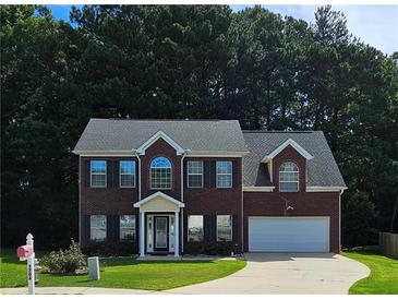 Photo one of 7706 Crestwicke Crossing Dr. Dr Jonesboro GA 30236 | MLS 7417361