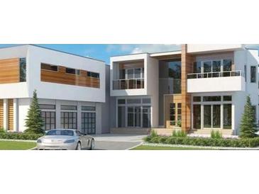 Modern house exterior with attached garage at 1711 Grand Cayman, Stockbridge, GA 30281