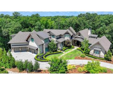 Luxury home with large backyard and circular driveway at 962 Chattooga Trce, Suwanee, GA 30024