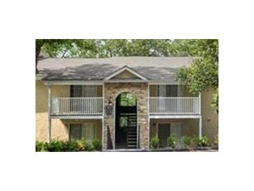 Two story apartment building with stone accents and balconies at 2955 Seven Pines Ln # 206, Atlanta, GA 30339