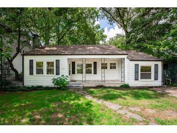 Charming white house with a porch at 153 Hood Cir, Decatur, GA 30030