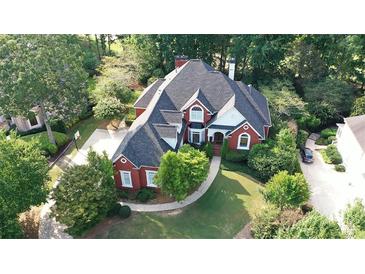 Photo one of 6610 Sunbriar Dr Cumming GA 30040 | MLS 7439046