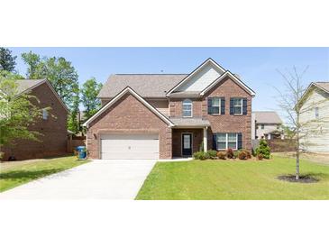 Two story brick home with attached garage at 1505 Clubhouse Ct, Mcdonough, GA 30252