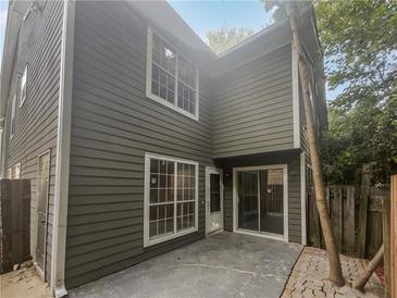 Exterior view of townhouse with patio at 1097 Rock Creek Ln, Norcross, GA 30093