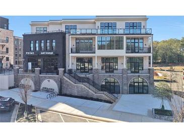 Modern commercial building with a nail lounge on the ground floor at 8200 Main S St # 1306, Woodstock, GA 30188