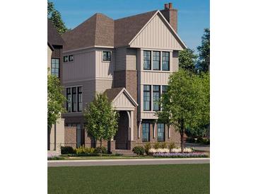 Three story house with brick and siding at 2270 Park Walke Dr, Alpharetta, GA 30009
