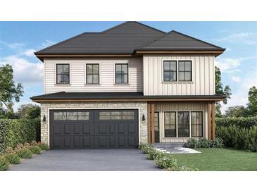 Two story house with dark garage door and light colored exterior at 2884 Thompson Cir, Decatur, GA 30034