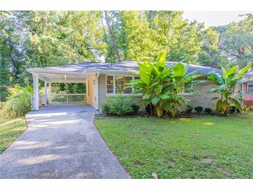 Ranch house with covered porch and landscaped yard at 2812 Mitchell Dr, Decatur, GA 30032
