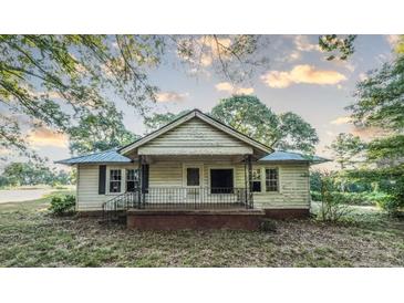 Charming one-story house with a porch at 2164 Five Points Rd, Waco, GA 30182