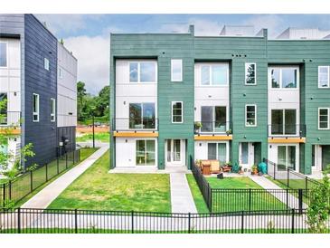 Modern townhome with private backyard and fenced patio at 2029 Memorial Dr # 33, Atlanta, GA 30317