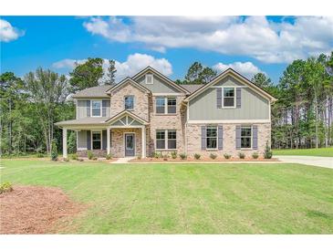 Two story home with brick and siding exterior at 25 Homesite Cooper E Cv, Fayetteville, GA 30215