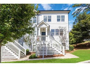 Two-story home with gray siding, white trim, and a front porch at 1405 Attwater Dr, Atlanta, GA 30316