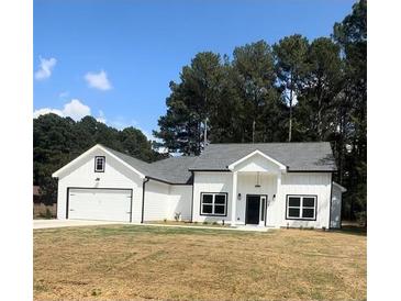 Photo one of 20 Otelia Ln Covington GA 30014 | MLS 7456634