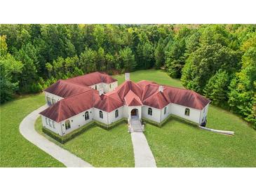 Luxury home with red roof and large yard at 2000 Enon Sw Rd, Atlanta, GA 30331