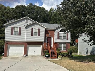 Photo one of 5838 Cedar Croft Ln Lithonia GA 30058 | MLS 7461782