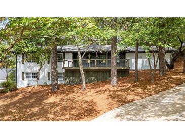 Charming ranch home with a newly renovated deck and landscaping at 2228 Old Dallas Sw Rd, Marietta, GA 30064