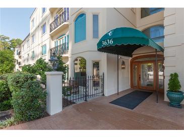 Elegant building entrance with awning and landscaping at 3638 Peachtree Ne Rd # 304, Atlanta, GA 30319