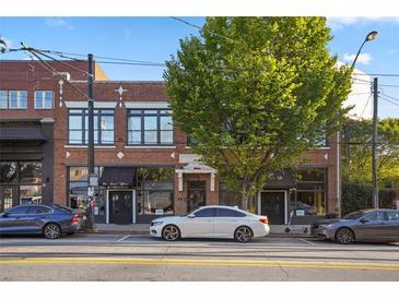 A commercial building with street-level retail space and upper-level offices at 323 Edgewood Se Ave # A, Atlanta, GA 30312