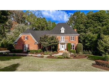 Brick home with two-car garage and manicured lawn at 2725 Florence Ann Ter, Buford, GA 30519