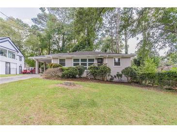 Charming ranch home with mature landscaping and a spacious yard at 2362 Manor Ave, Atlanta, GA 30344