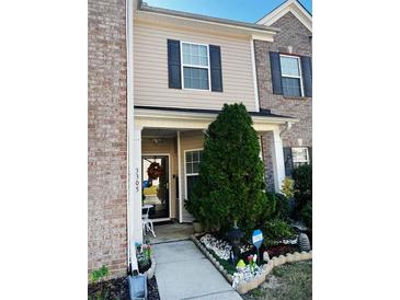Inviting brick front exterior with landscaping and walkway at 2555 Flat Shoals Rd Apt # 3305, College Park, GA 30349