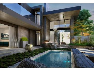 Luxury home with a modern pool and patio area at 748 Charles Allen Dr, Atlanta, GA 30308