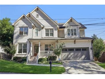 Two-story house with gray garage and white brick facade at 2761 Alpine Ne Rd, Atlanta, GA 30305