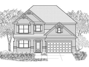 Two-story house with brick exterior, shutters, and a two car garage at 3864 Kastler Dr, South Fulton, GA 30349