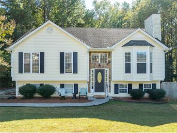 Charming one-story house with a landscaped yard at 304 Ridge Hill Cir, Canton, GA 30115