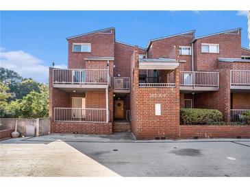 Brick townhome with private balcony and parking at 385 Ralph Mcgill Ne Blvd # D, Atlanta, GA 30312