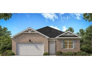Brick one-story house with a two-car garage and landscaping at 569 Whitman (Lot 159) Ln, Stockbridge, GA 30281