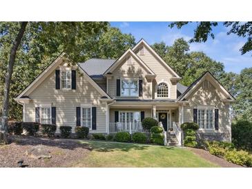 Two story house with landscaping and stone accents at 1400 Lamont Cir, Dacula, GA 30019