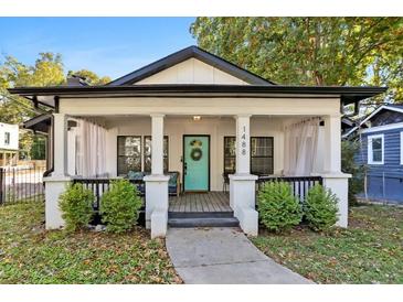 Charming craftsman bungalow with a front porch at 1488 Beecher Sw St, Atlanta, GA 30310