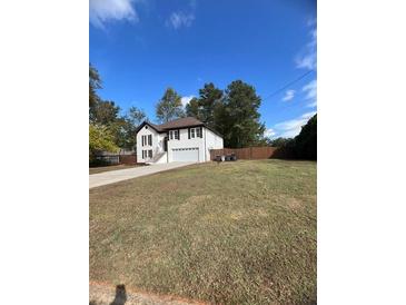 Photo one of 1925 Hunt Crossing Ct Lawrenceville GA 30043 | MLS 7481252