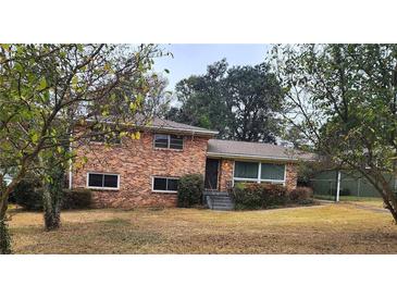 Brick ranch house with a spacious yard at 2379 Miriam Ln, Decatur, GA 30032