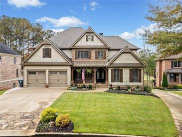 Two-story house with stone and shingle accents at 1617 Fernstone Nw Dr, Acworth, GA 30101