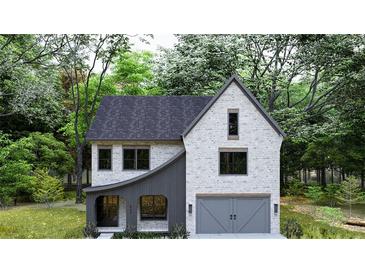 Two-story house with gray siding, gray roof and a modern design at 300 Hillcrest View Dr, Suwanee, GA 30024